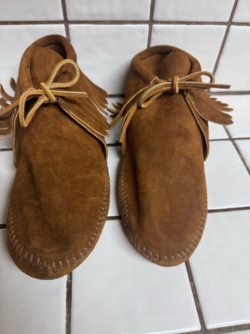 Minnetonka Chestnut Suede Moccasins with Fringe Detail